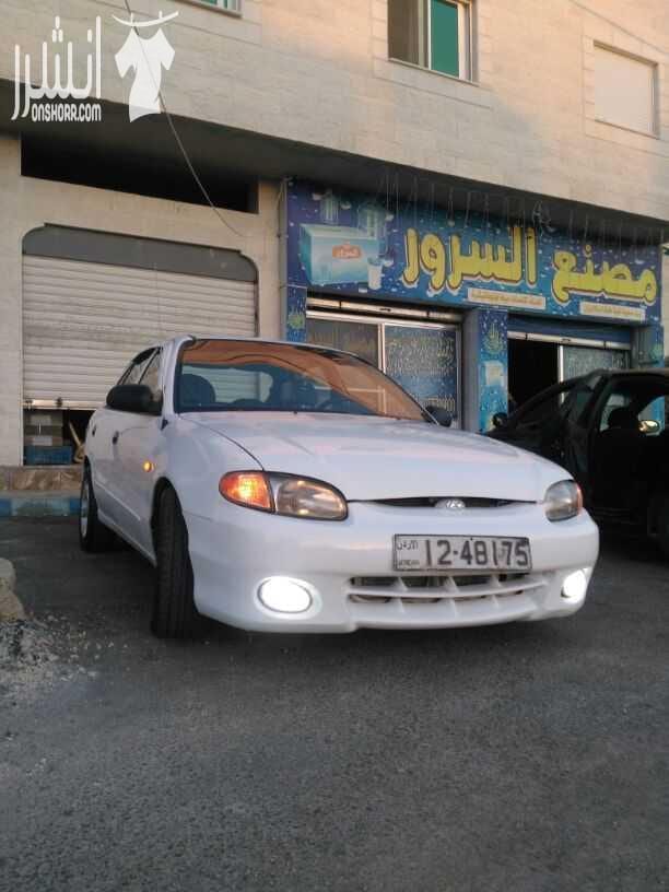 هونداي اكسنت موديل ١٩٩٧ هاتشباك قصة الدب لون ابيض ثلجي تم نفض كامل مع دهان جديد ترخيص لغايه شهر ١/ ٢٠١٩ كندشن حامي بارد شغال ١٠٠% الفحص أمامي يمين جيد قصعه امامي شمال ضربه بنكيت خلفي يمين و شمال هريان...
