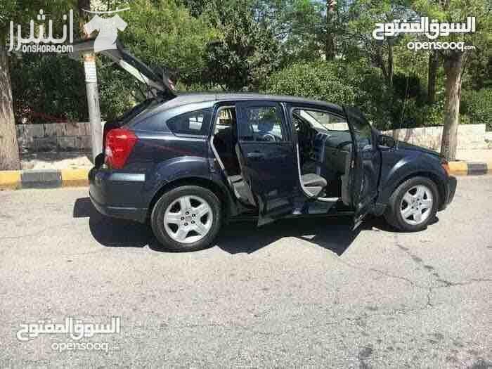 دودج كالبر الفحص 4 جيد ماتور 2000 سي سي جير اوتوماتيك لون فيراني مميز وضع السيارة توب نظافة صيانة كاملة من زيوت فلاتر بركات بواجي هيئة امامية خلفيو من صنوبرصات و كفات و عمدان توازن و جلود (لا...