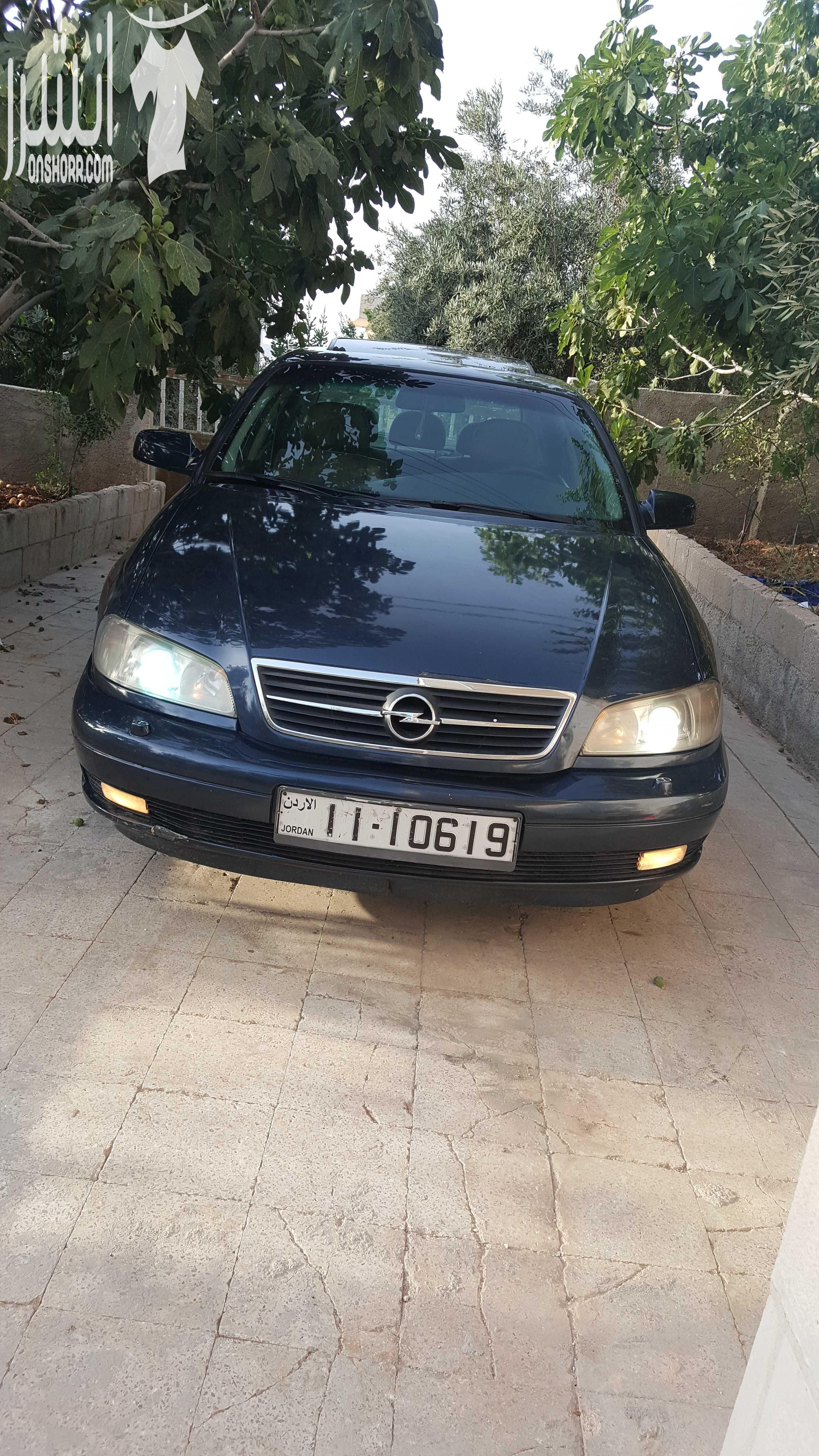 اوبل اوميغا موديل 2003 لون كحلي 2200سي سي ،جنط 17 اصلي، فتحة، حساسات خلفية اصلية، مثبت سرعة، مسجل philips مع سي دي تشينحر اصلي، تحكم طارة، اضوية زنون، نظام امان للاطفال و السرقة، فرش جلد، كراسي كهرب...