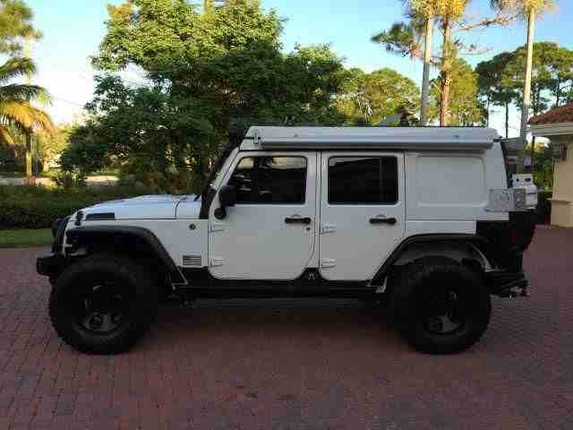 2013 Jeep Wrangler Unlimited Rubicon for sale , it is still very clean and neat, full option with perfect tyres, no mechanical fault or accident record ( george_wilson014@hotmail.com )